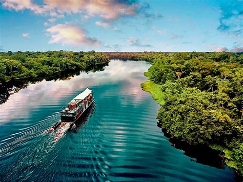 Amazon River by Boat with Rainforest Cruises: Traveling Boy