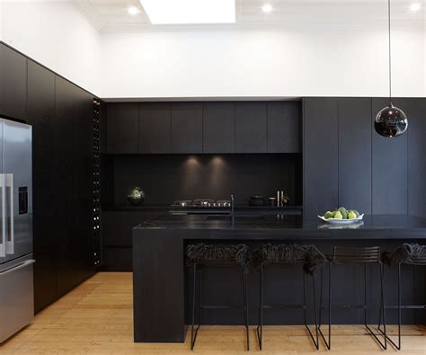 A matte black kitchen makes a bold statement in this Auckland villa | Modern black kitchen ...