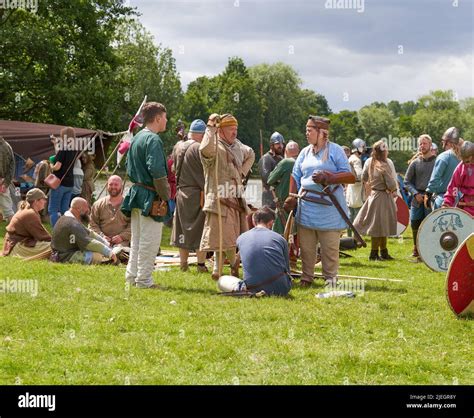 Viking warriors gathering at a reenactment festival event Stock Photo - Alamy