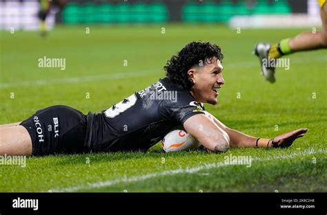 New Zealand's Dallin Watene-Zelezniak scores their side's fourth try during the Rugby League ...