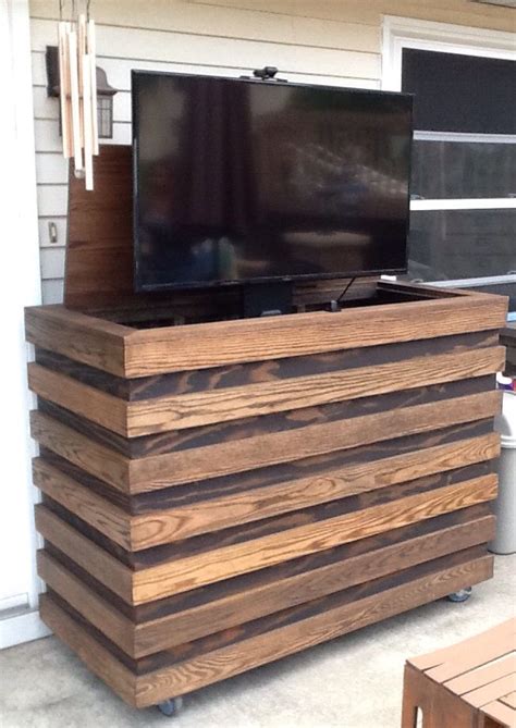 Outdoor TV. Homemade custom TV cabinet with remote TV lift. | Outdoor tv stand, Outdoor tv ...