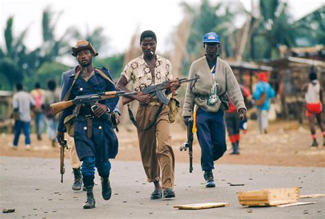 Patrick Robert Photographe | NPFL Rebels Patrolling During Civil War in Liberia