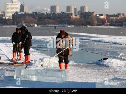 More than a dozen mining icemen work hard to harvest ice cubes in ...