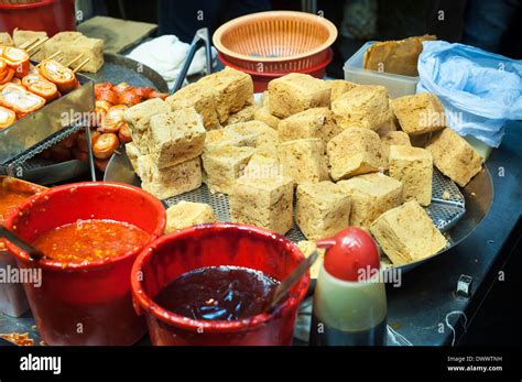 Stinky fried tofu at a Hong Kong street food stall Stock Photo - Alamy