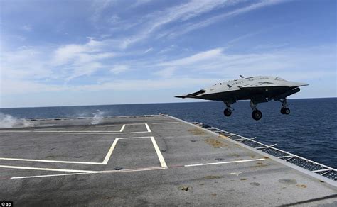 U.S. Navy's X-47B 'stealth drone' launches from an aircraft carrier for the first time - as ...