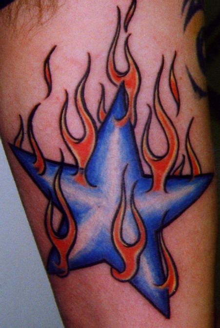 Flaming star tattoo ~ TATTO69