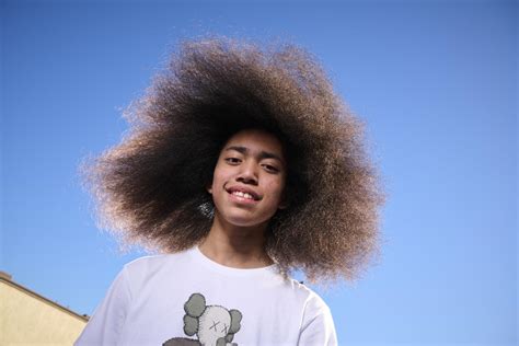 Meet the 14-year-old with the Guinness Record for world's largest afro ...