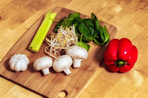 Assorted Vegetables and Spices on Wood Surface · Free Stock Photo