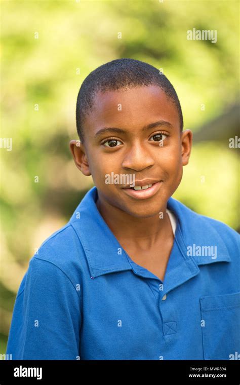 African American young boy smiling Stock Photo - Alamy