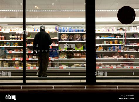 Supermarket at night photographed from outside Stock Photo - Alamy