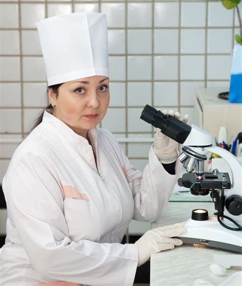 Doctor With Microscope In Lab Stock Photography - Image: 22463482