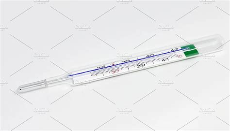 Download A mercury thermometer featuring ill, diagnostic, and sick Photos Free - Kufonts.com
