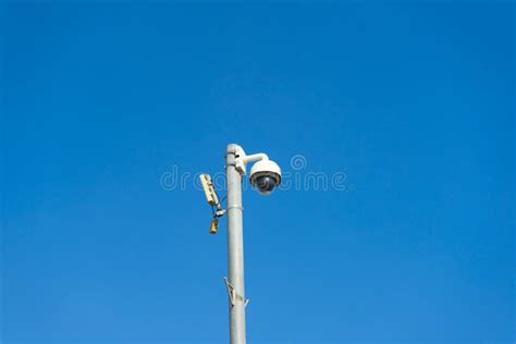 Outdoor Surveillance Camera on a Pole Stock Image - Image of alarm ...