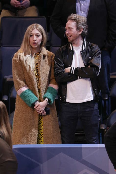 Celebrities sitting courtside at NBA All-Star Game