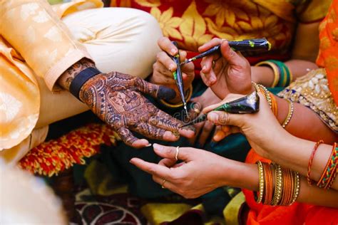 Indian Wedding Ceremony : Groom Hand with Mehandi Design Stock Photo ...