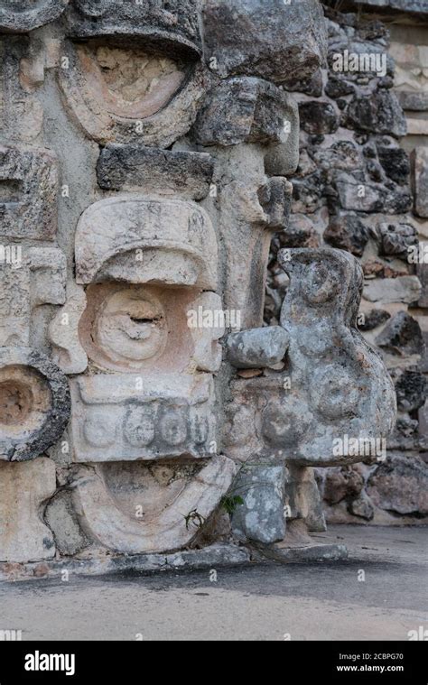 Decorative Chaac mask with its curling nose in the Puuc style on the Temple of the Macaw on the ...