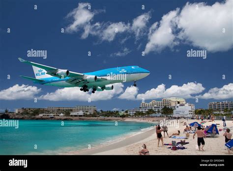 KLM Boeing 747 landing over the beach of Saint Maarten, the island of ...