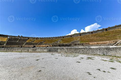 Amphitheatre in ancient Roman city of Pompeii. The Amphitheatre of Pompeii is one of the oldest ...