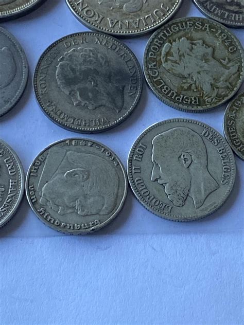 10 ASST SILVER CONTENT FOREIGN COINS SOME GOOD GRADES