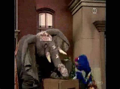 Here is Grover playing carrom with an elephant on Sesame Street : ABCDesis