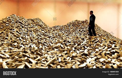 Man On Pile Gold Bars Image & Photo (Free Trial) | Bigstock