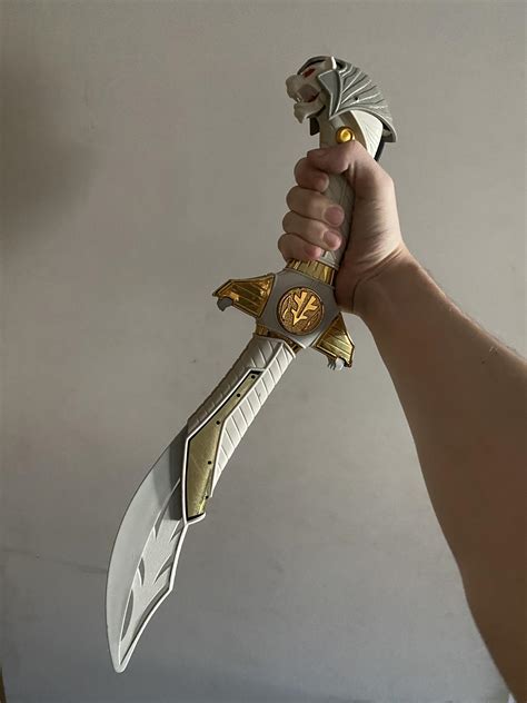 Found my White Ranger Saba sword, still works too. : nostalgia