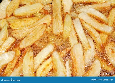 French Fries Frying in Oil stock image. Image of oiled - 9687719