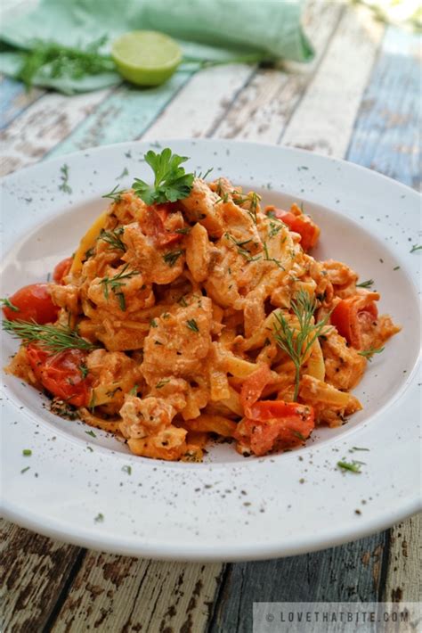 Creamy Tomato Salmon Pasta - lovethatbite.com