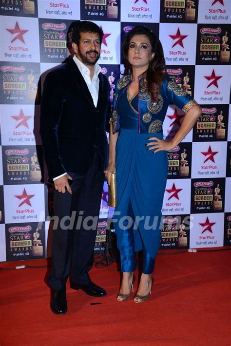 Kabir Khan poses with wife Mini Mathur at the 22nd Annual Star Screen ...