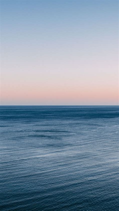 Calm and beautiful sea, clean skyline, sunset, 1080x1920 wallpaper | Ocean wallpaper, Beach ...