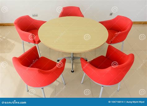 Rounded Table and Chairs in an Office Stock Photo - Image of tray ...