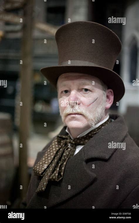 Actors portraying Victorian Dickensian characters at Dickens World in ...