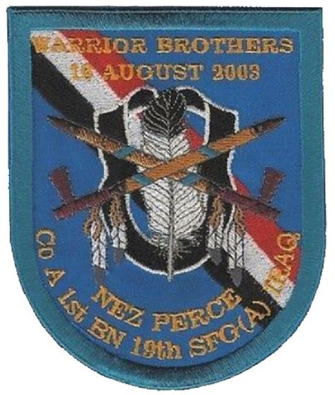 an embroidered patch with the words, major brothers in august 2009 as well as two crossed swords