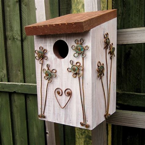 A decorated bird nest box | Bird boxes, Nesting boxes, Bird house