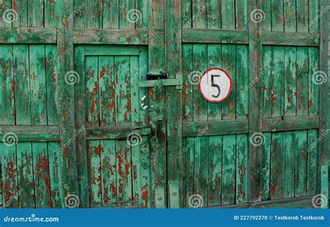 Wooden Gate with Green Peeling Paint and Sign 5 Stock Photo - Image of ...