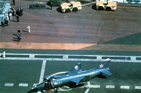 A Yak-36 Forger aircraft parked on the flight deck of the Soviet ...