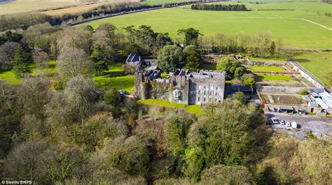 800-year-old Norman fortress complete with battlements goes on the market in Wales for £11 ...