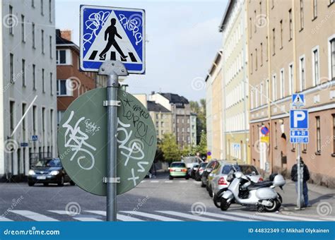 Road Signs with Graffiti at a Crossroads Stock Image - Image of ...