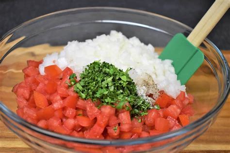 Diced tomatoes, onions, chopped cilantro, salt and pepper in a large ...