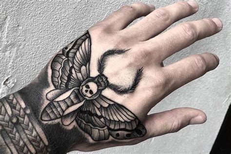 40 Best Tattoo Ideas for Men | Hand tattoos for guys, Hand tattoos, Traditional hand tattoo