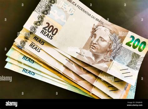 Be rich with money in Brazil. 200 Brazilian banknotes Reaís Real R$ BRL Stock Photo - Alamy