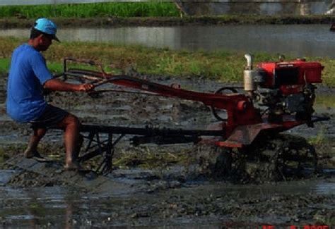 Fig. __. Kuliglig hand tractors, with trailing or riding attachments ...