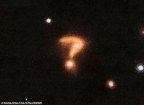 Is anyone out there? Astronomers spot a spooky looking QUESTION MARK ...