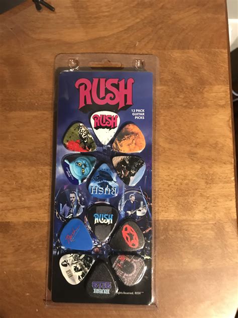 Some neat RUSH guitar pick. : r/rush