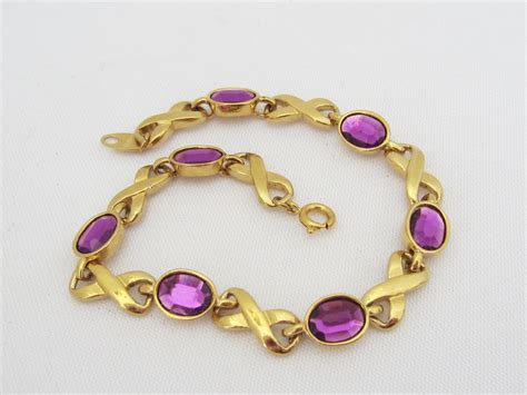 Vintage By AVON Jewelry Gold Tone Purple Rhinestone Link
