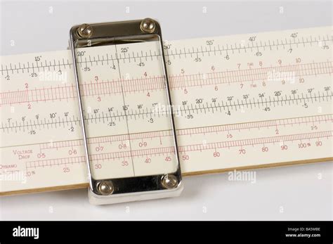 Detail of a slide rule scale and cursor of a slide rule Stock Photo - Alamy