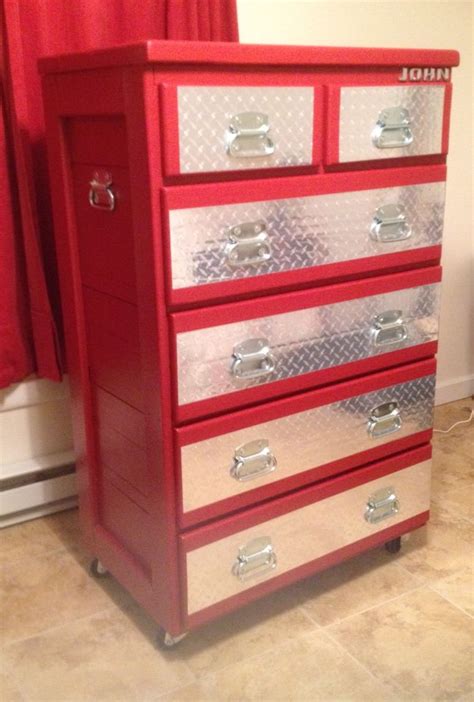 This is a dresser that I got from auction and repurposed and made it look like a toolbox for the ...