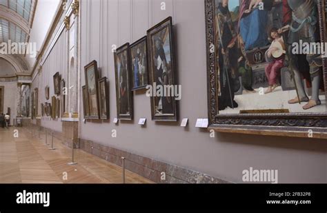 Paris, France, People take photos of famous artworks in the Louvre ...