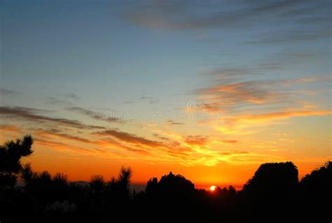 Huangshan Mountain in Anhui Province, China. Sunrise Over Huangshan with Colorful Sky and Trees ...