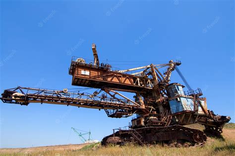 Premium Photo | Photo of industrial machinery for digging pit mining of ...